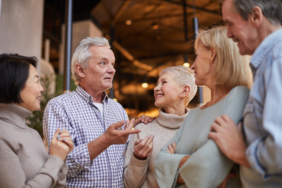 elderly-friends-discussing-news